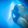 Underwater close up portrait of a woman