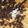 Good Morning. Paper Coffee Cup With Coffee Bean on The Wooden Table