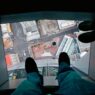 Glass floor at the top of Sky Tower, Auckland, North Island, New Zealand